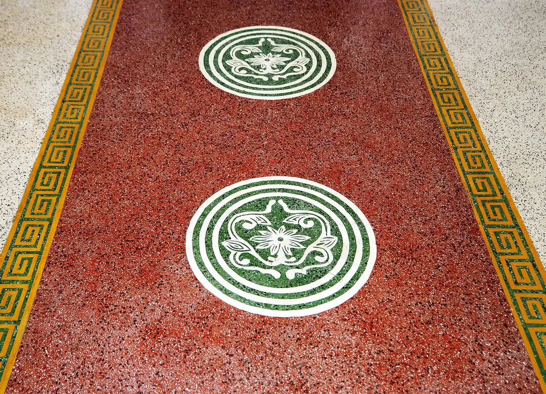 Decorative floor with intricate circular patterns.