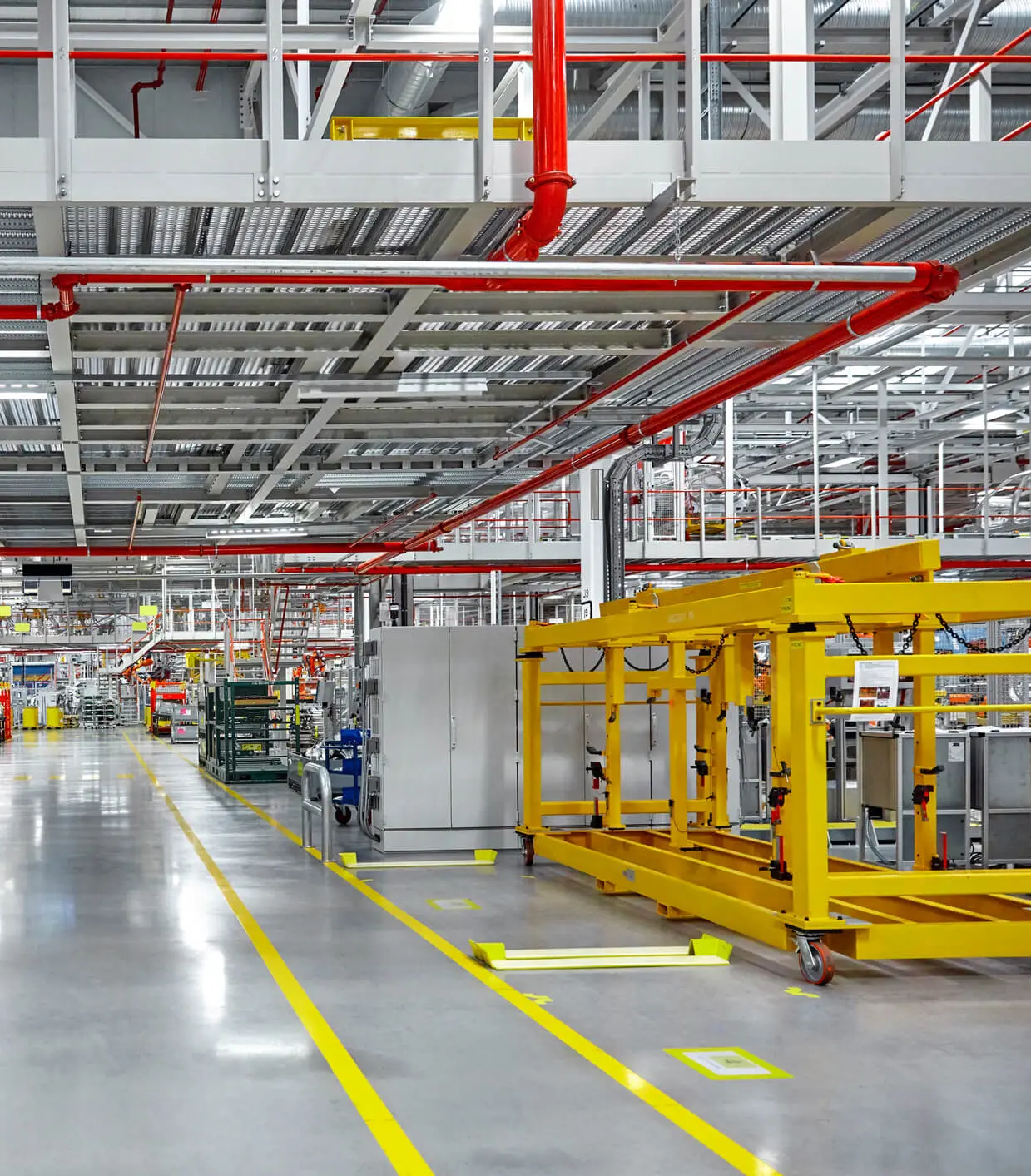 Modern industrial factory interior with machinery.