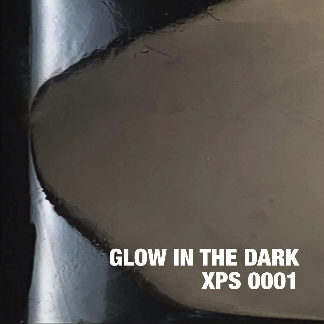 Glow-in-the-dark object with text overlay.