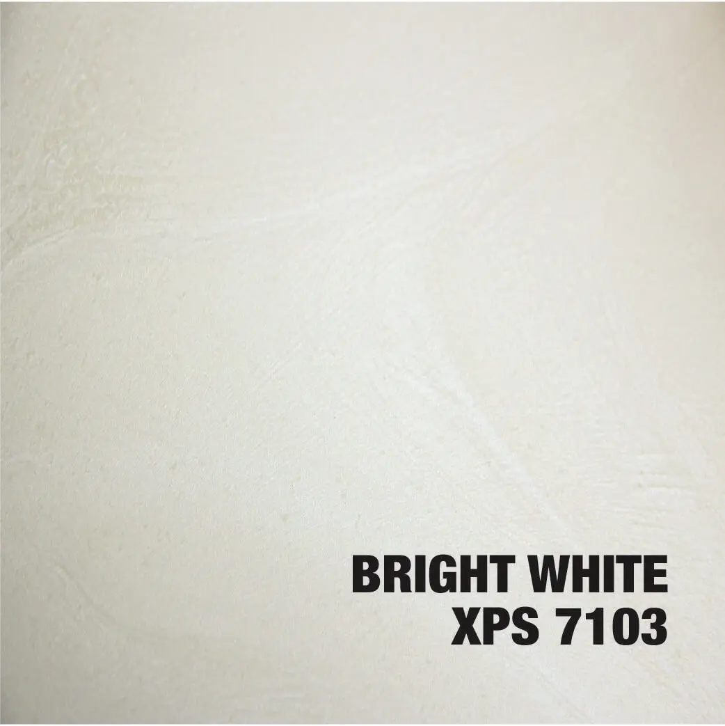 Bright white textured surface with text.