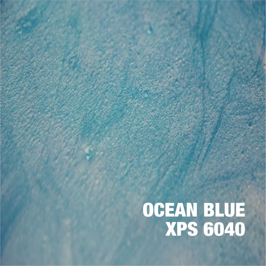 Ocean blue textured surface with text.