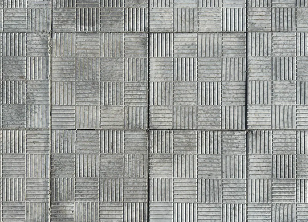 Gray checkered tiles with textured pattern.